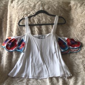 A very cute off the floral shoulders top